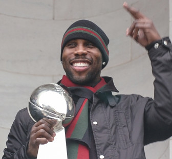 Baltimore Ravens wide receiver Anquan Boldin celebrates at the Ravens’ Super Bowl XLVII victory parade on Feb. 5, 2013. (Credit: Public domain image/Wikipedia)