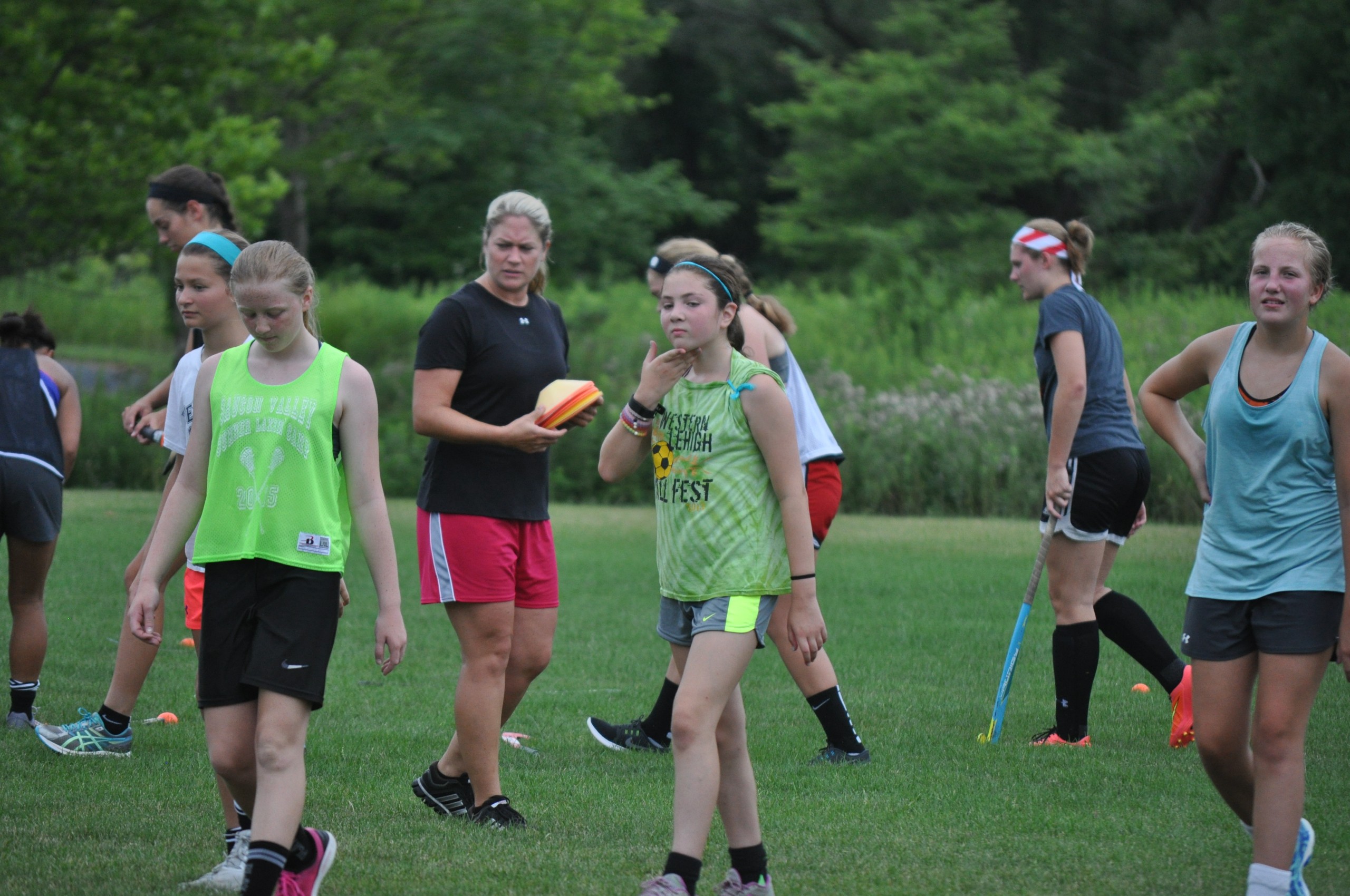 Saucon ValleyHigh School head field hockey coach Sarah Hawk setting up a drill for her team.