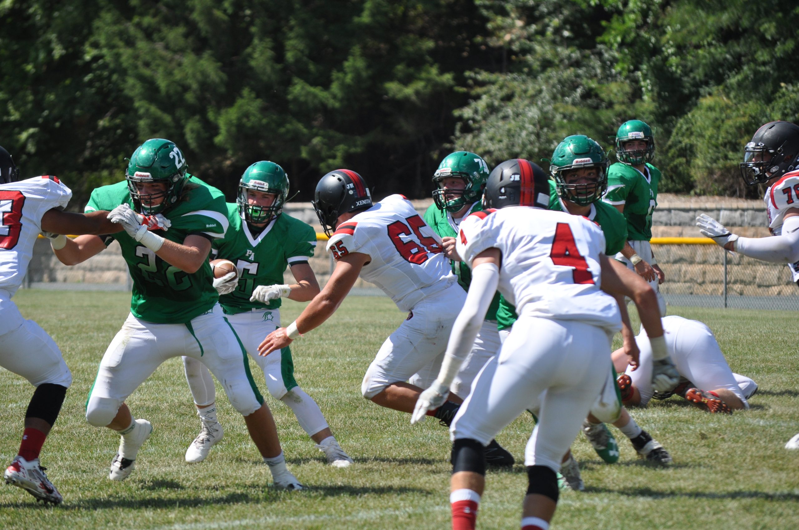 The high school girls basketball team started their practice with ball handling drills.