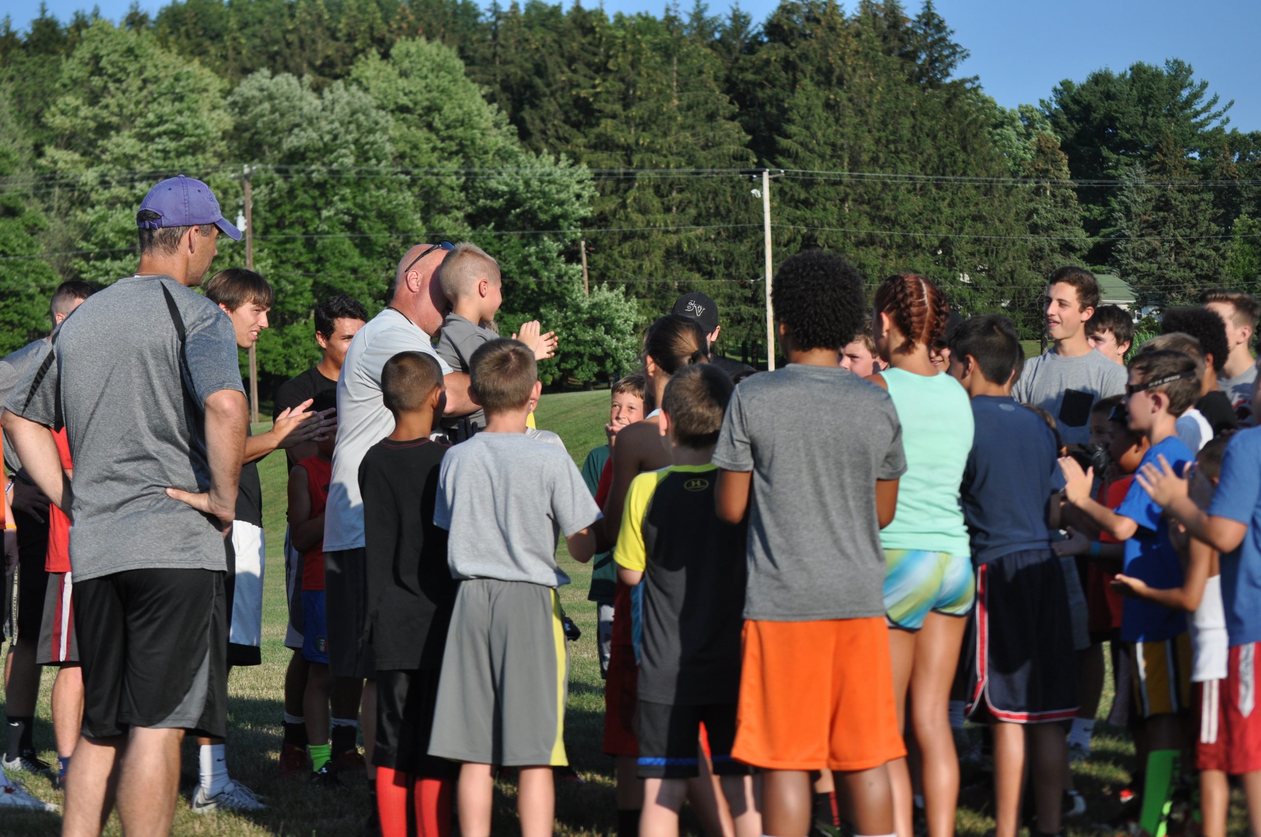 SVHS football defensive coordinator Chuck Muller and his new friend "breaking it down". 