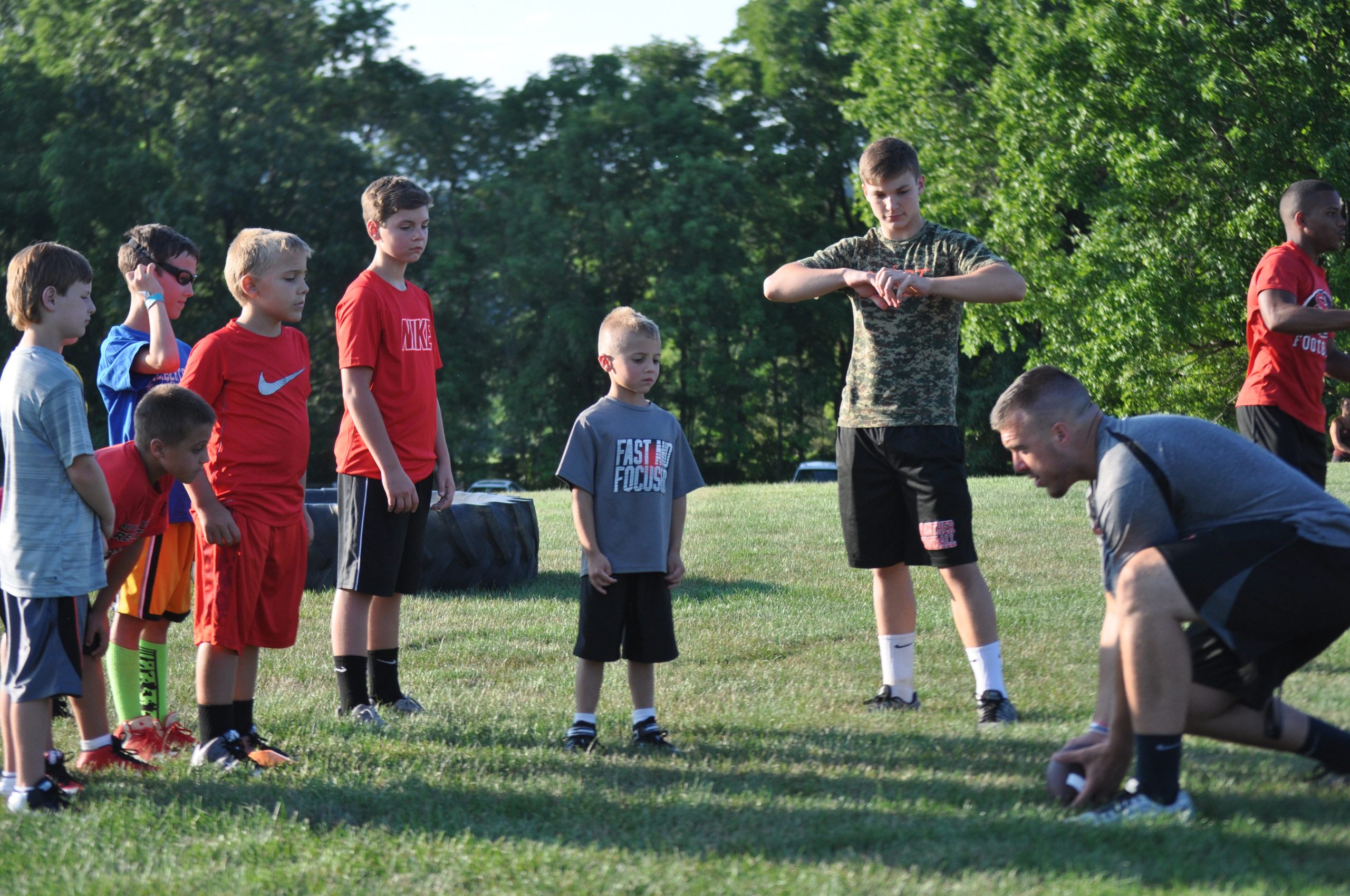 The art of scooping and scoring being demonstrated by SVHS assistant coach Cody Muller