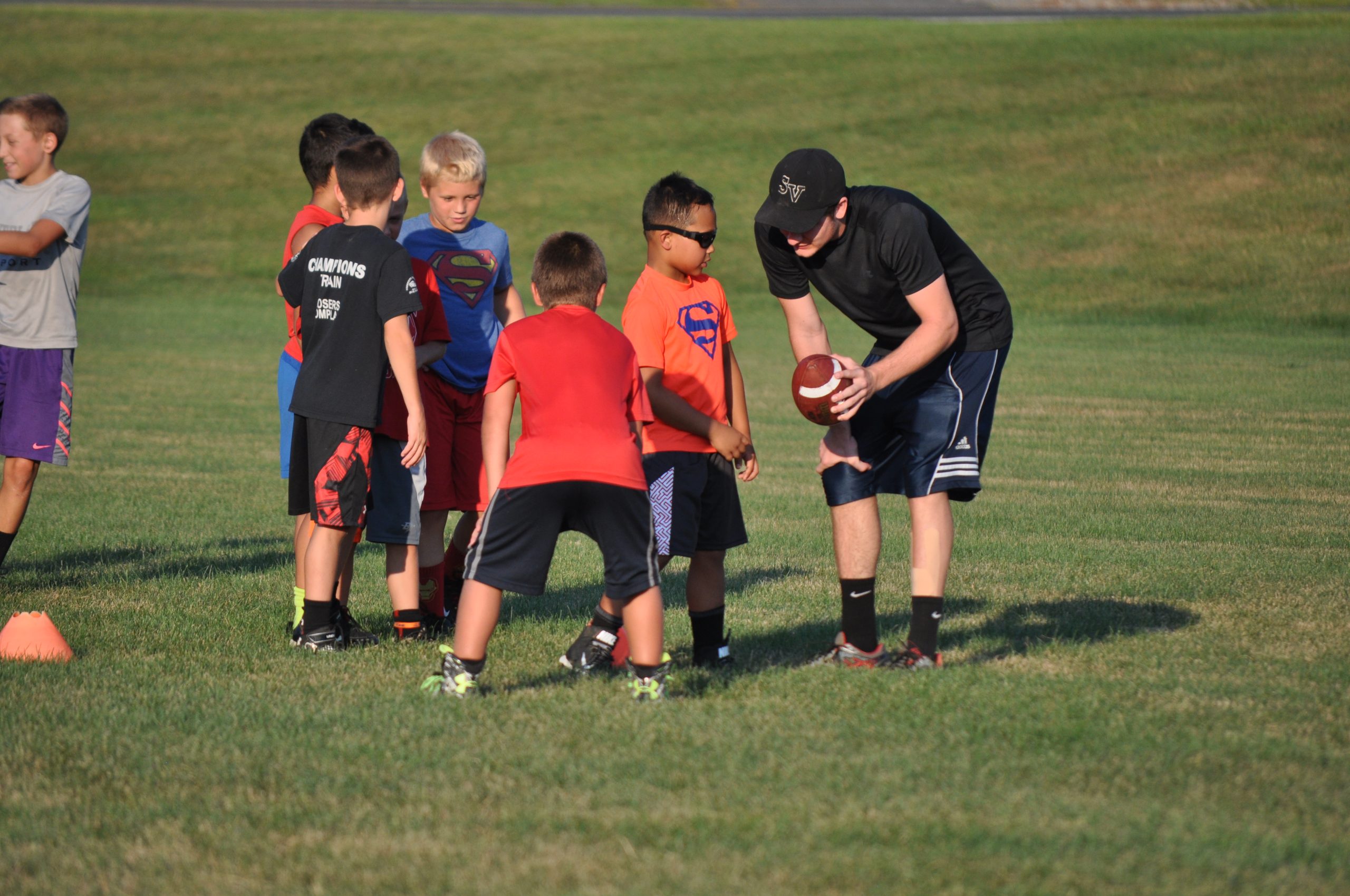 SV junior Alstan Wolfe sharing a secret to his success with a future Panther football star. 