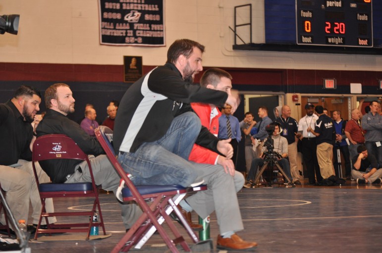 Coach Shirk caught up in the moment at the District XI Championships