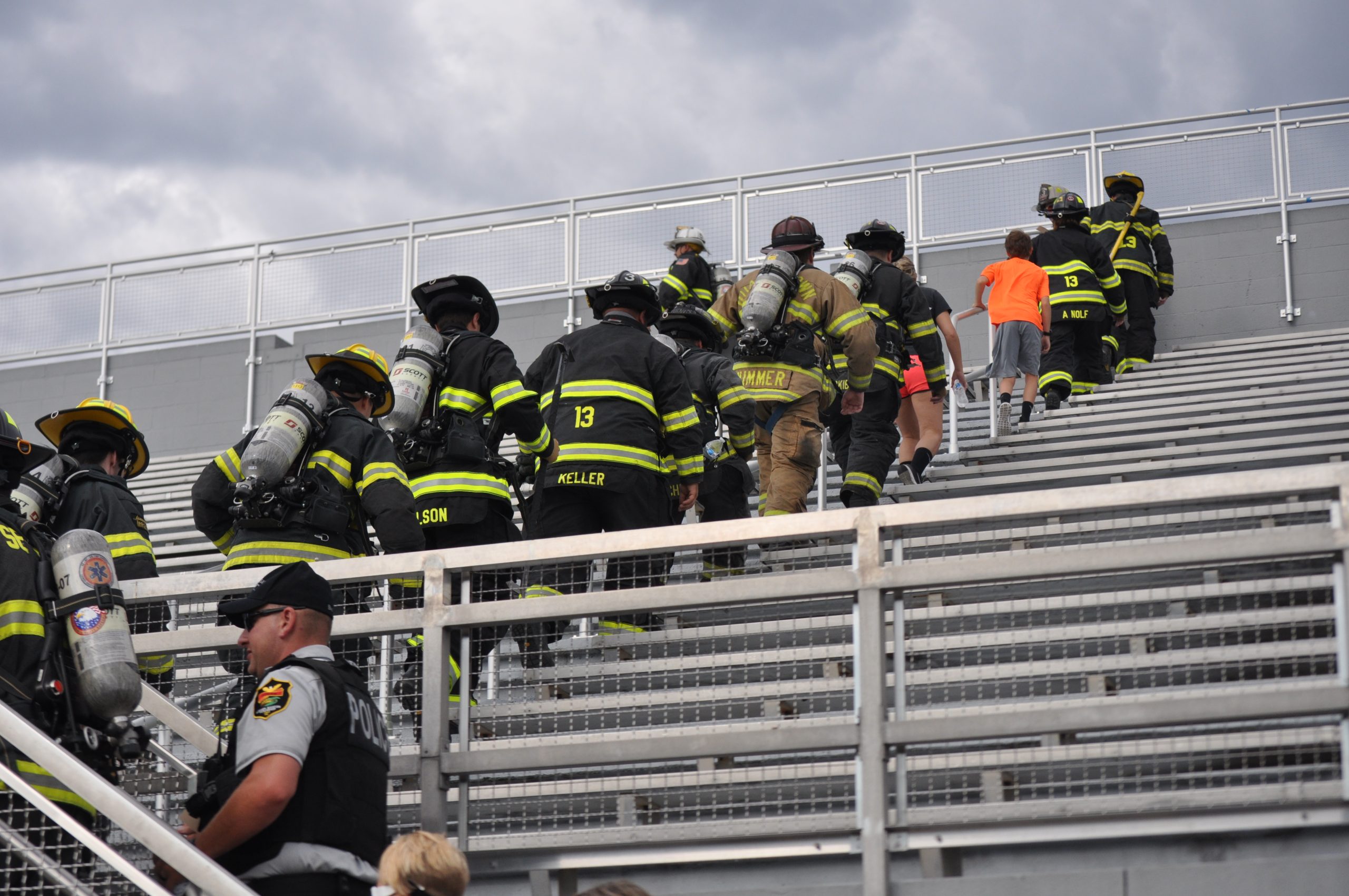 Saucon Valley firefighters and police officers make the climb.