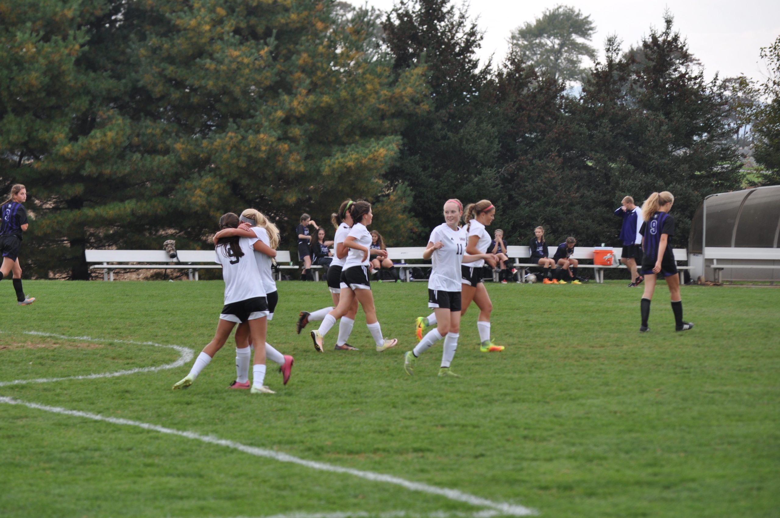 The Panthers celebrate Jessie Evans' game-winning goal against Palisades.