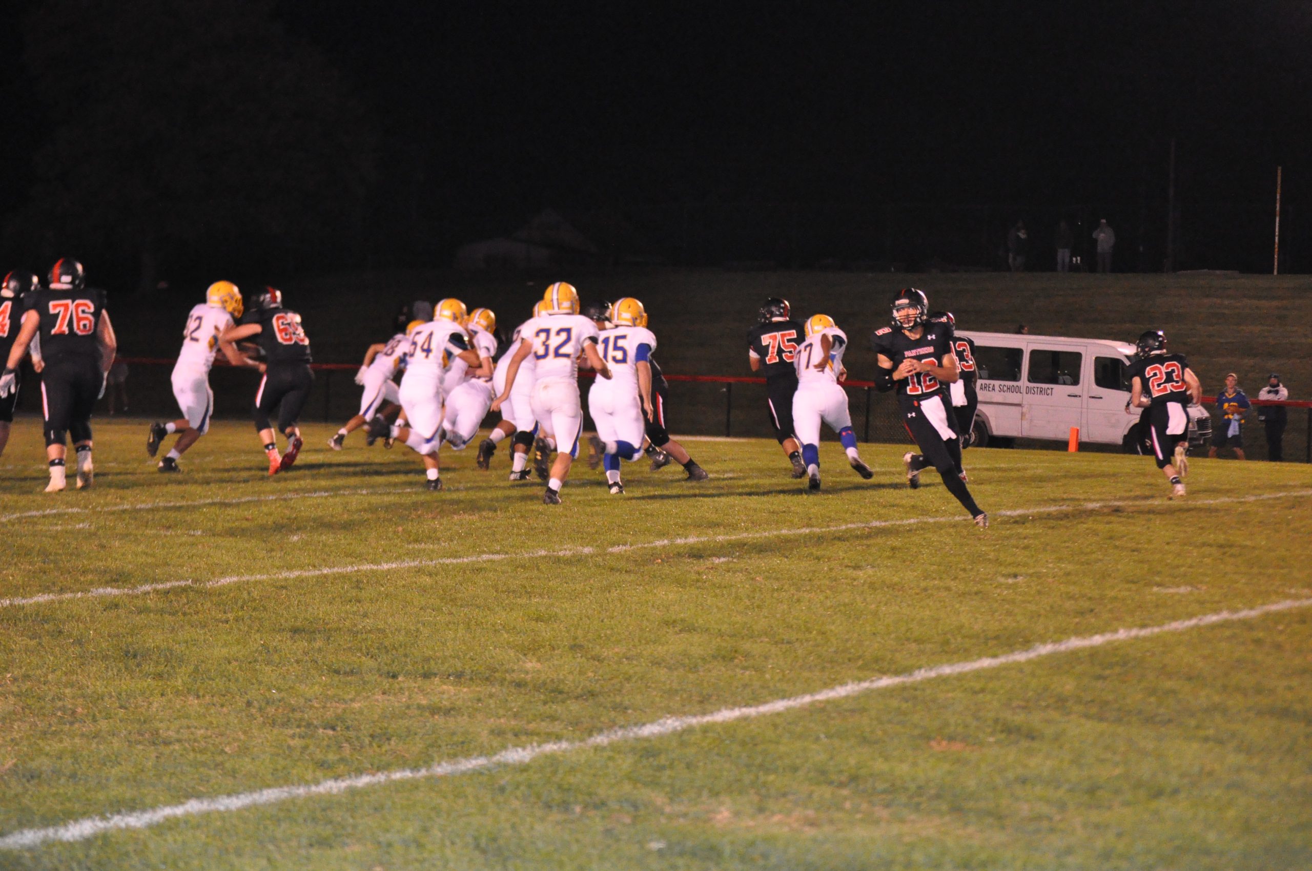 Saucon junior Zach Petiet following his Hogs as quarterback Brandon Holub boots away.