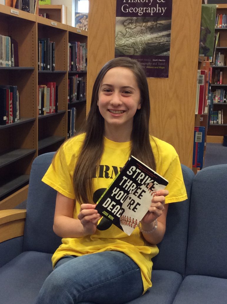 Maddie Lohr, a Saucon Valley Eighth grader, reading "Strike Three You're Dead" by Josh Berk.