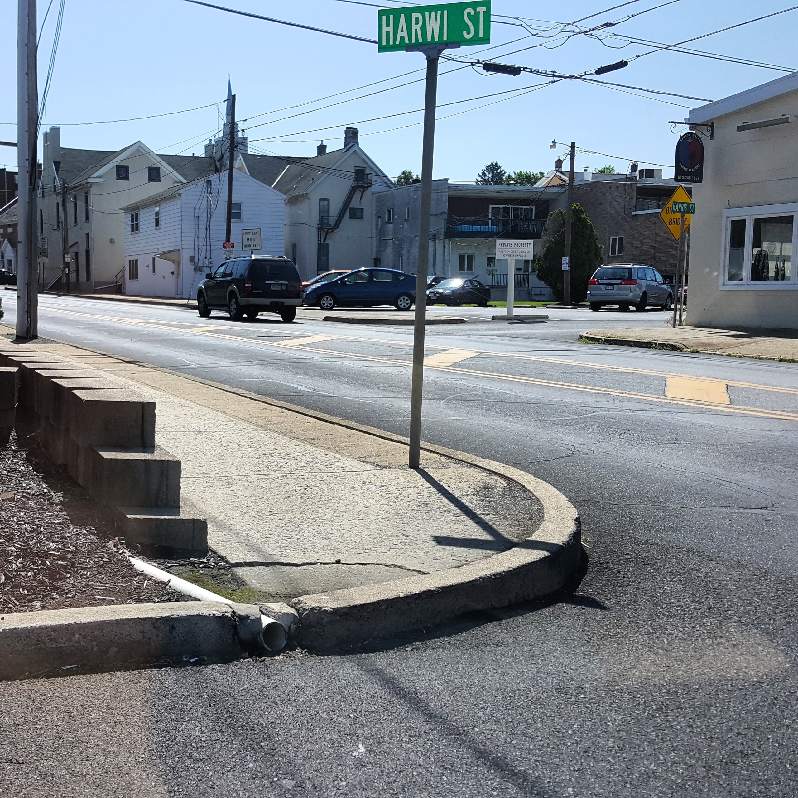 The intersection of Harwi and W. Water streets in Hellertown is notable for its lack of non-ADA compliant curbs, which represent an obstacle to disabled people.