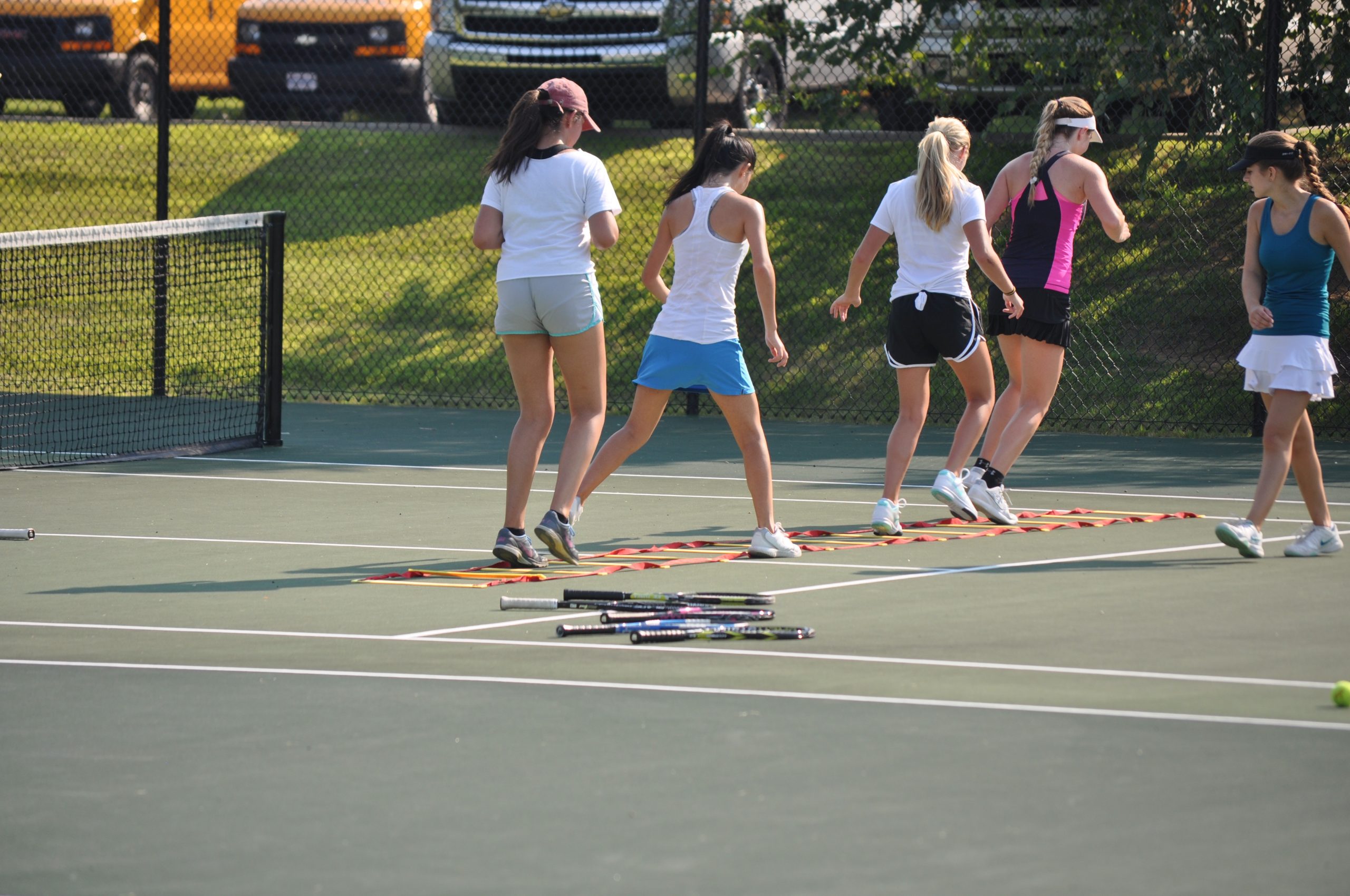 SVHS girls tennis running ladders