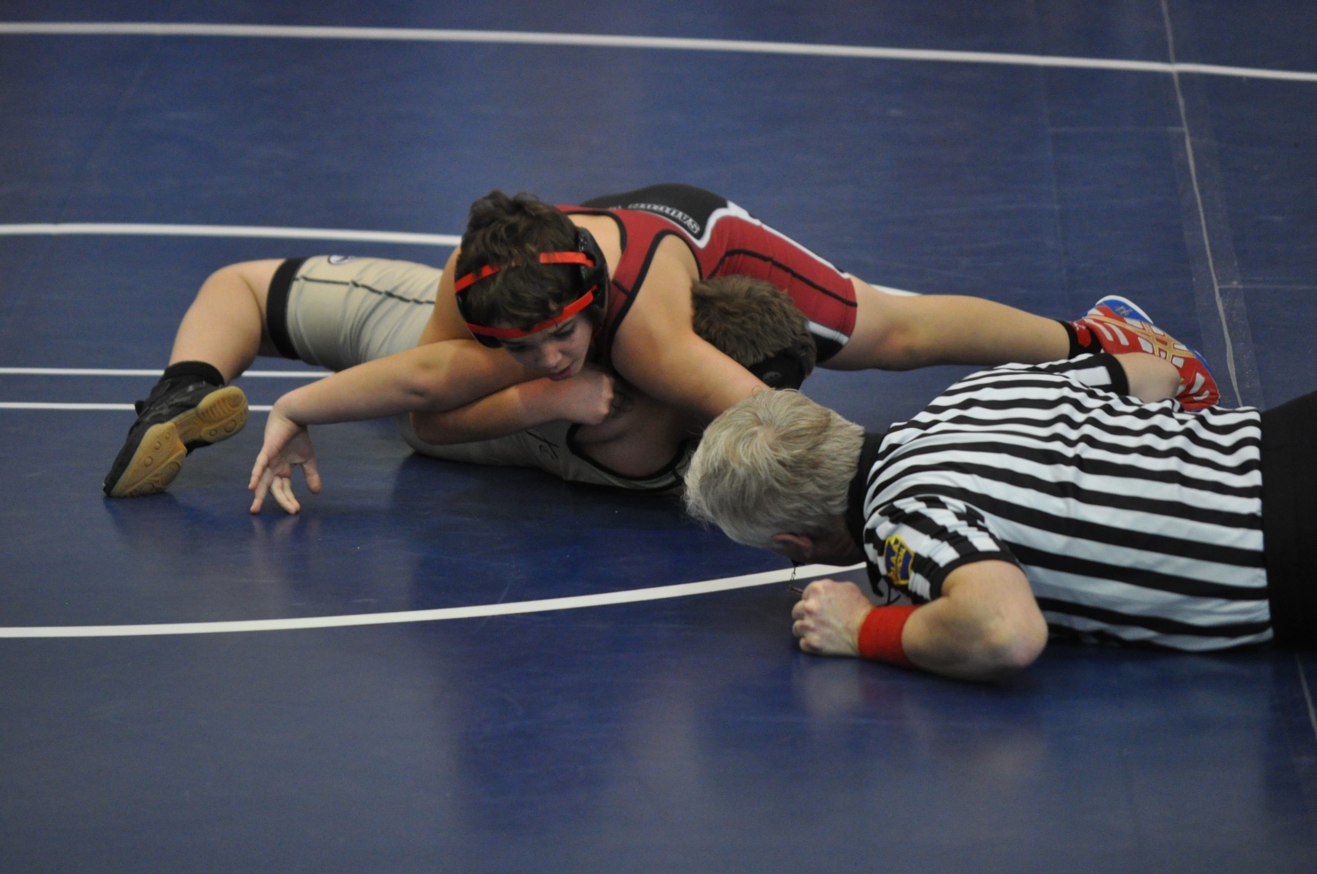 Saucon's Jared Blobe works a cement job for a near fall.