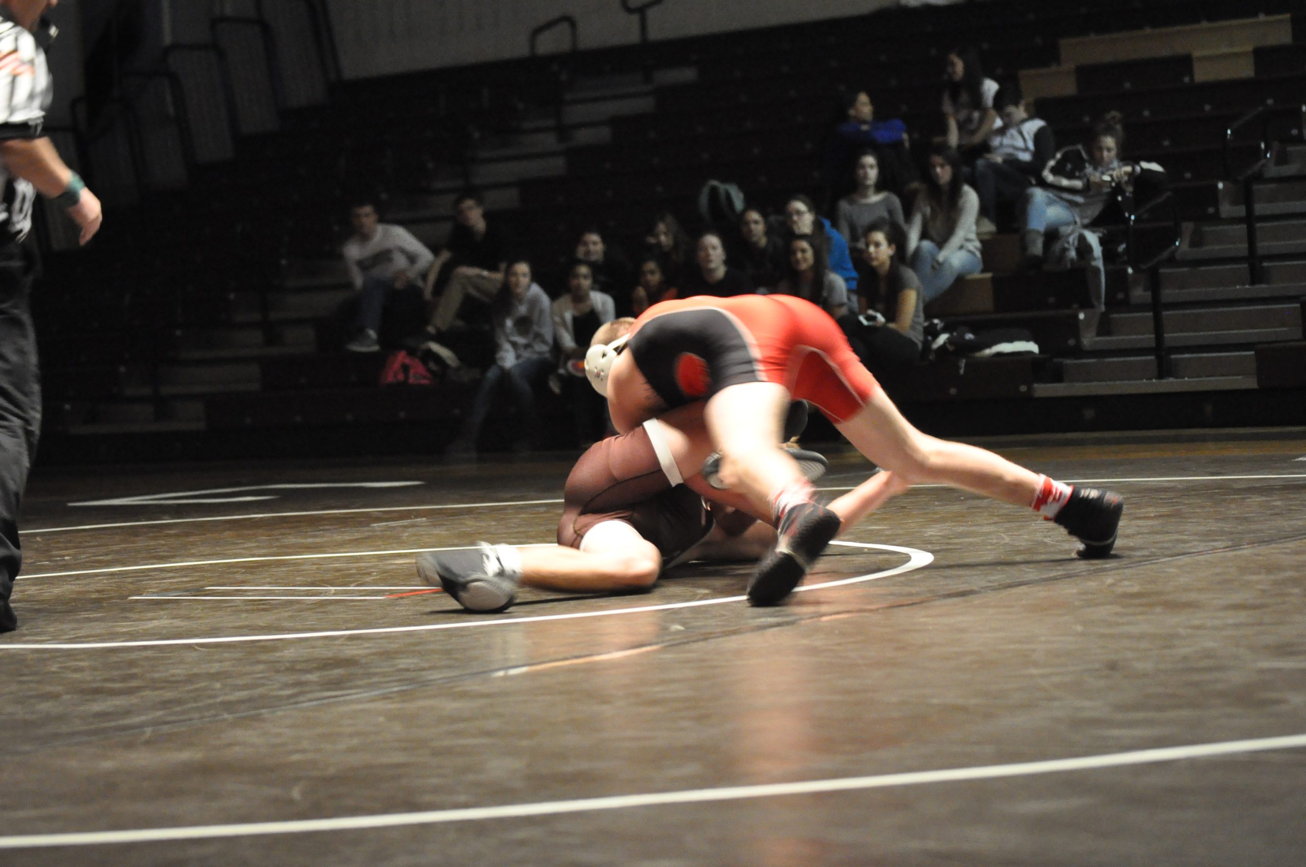 Saucon Valley senior Ty Druckenmiller trying to turn Catty's Brian Greene.