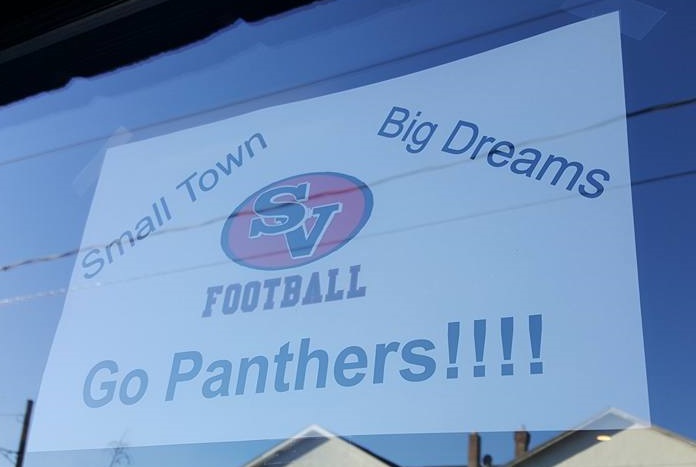 A sign expressing support for the Saucon Valley Panthers and their quest for a District XI football championship is hung in the window of Maui Kitchens, 1308 Main St., Hellertown. The Saucon Valley Football Booster Club has printed the signs and is distributing them to local businesses this week.